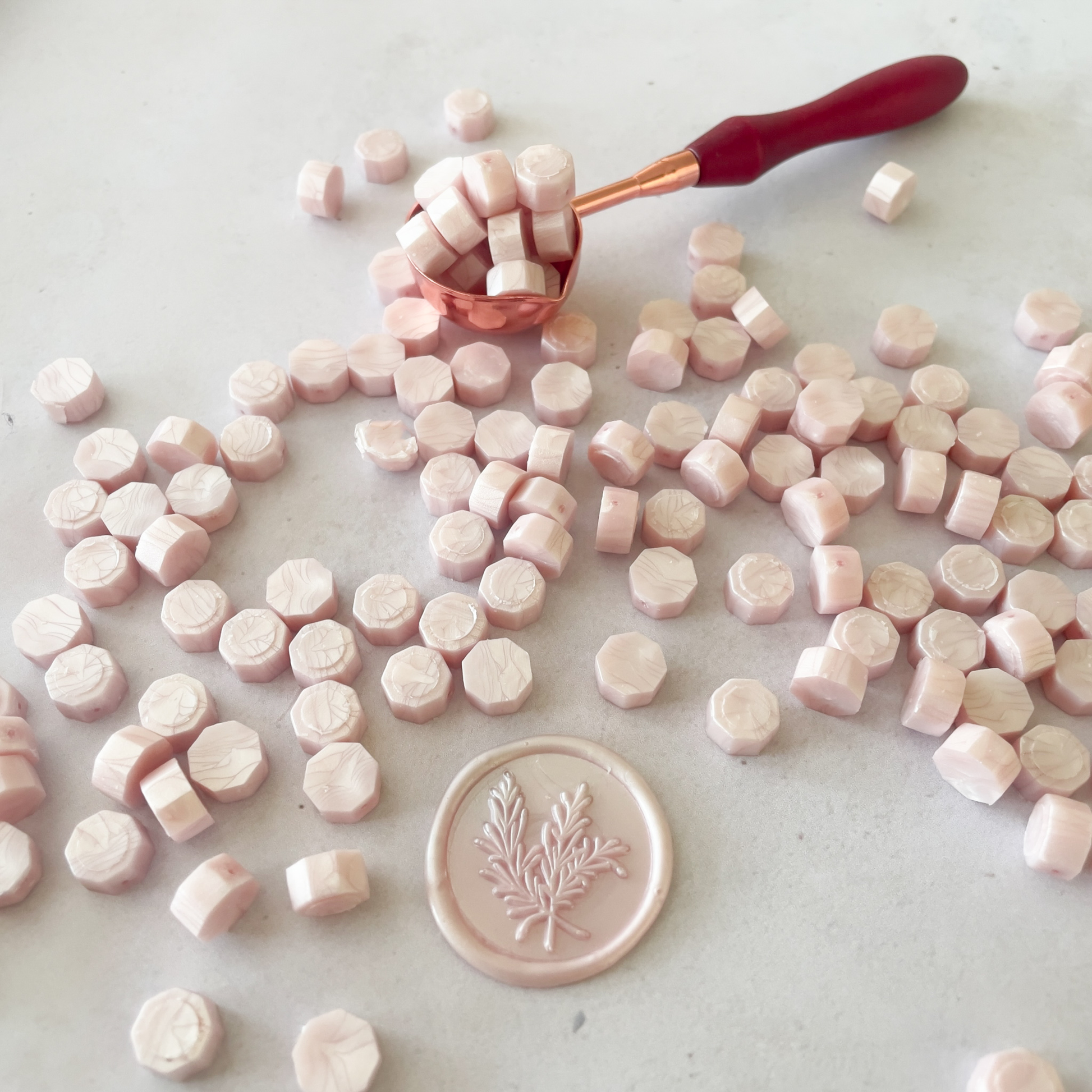 blush pink sealing wax beads with a pearlised finish.  Small wax beads for making wax stamps and seals.  
