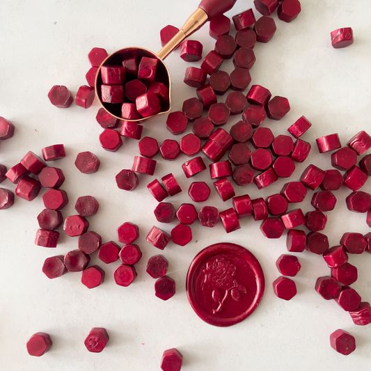 pearlised burgundy sealing wax beads.  Small wax beads for making wax stamps and seals