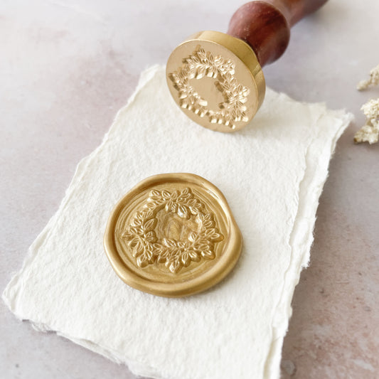 floral galand wax seal.  Wax stamp with floral wreath pattern.  Traditional wax seal to make wax stamps.