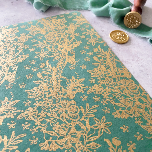 recycled cotton paper with gold flowery pattern.  Decorative A4 paper in green and gold.  Pretty recycled paper sold in A4 sheets
