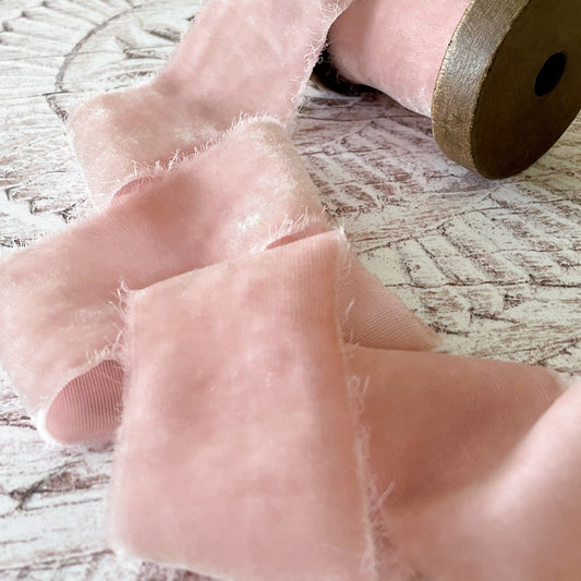 silk velvet ribbon in blush pink.  Light blush pink velvet ribbon made from silk.  Luxury fine velvet ribbon with frayed edge