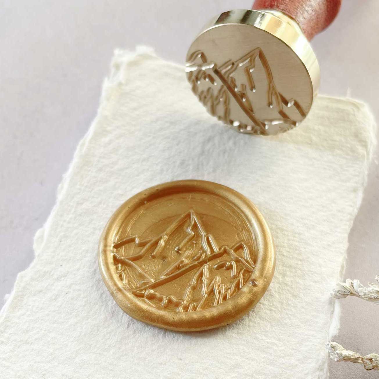 Mountain peak wax seals with an image of The Alps.  Sealing wax stamp for outdoor theme projects.  By The Natural Paper Company
