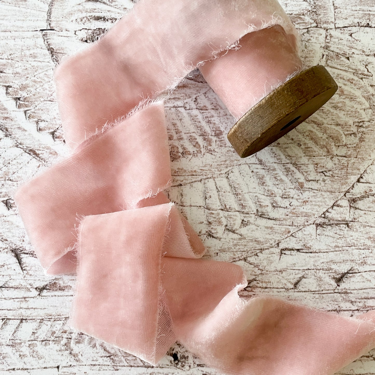 roll of light blush pink velvet silk ribbon.  Fine luxury velvet ribbon made from silk.  Natural ribbon in light pink colour