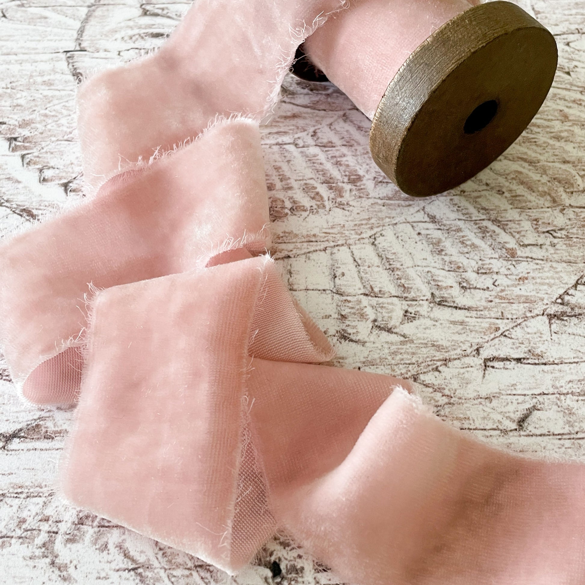 blush pink silk velvet ribbon.  Luxury fine velvet ribbon in light blush pink.  Pale pink velvet ribbon with frayed edges