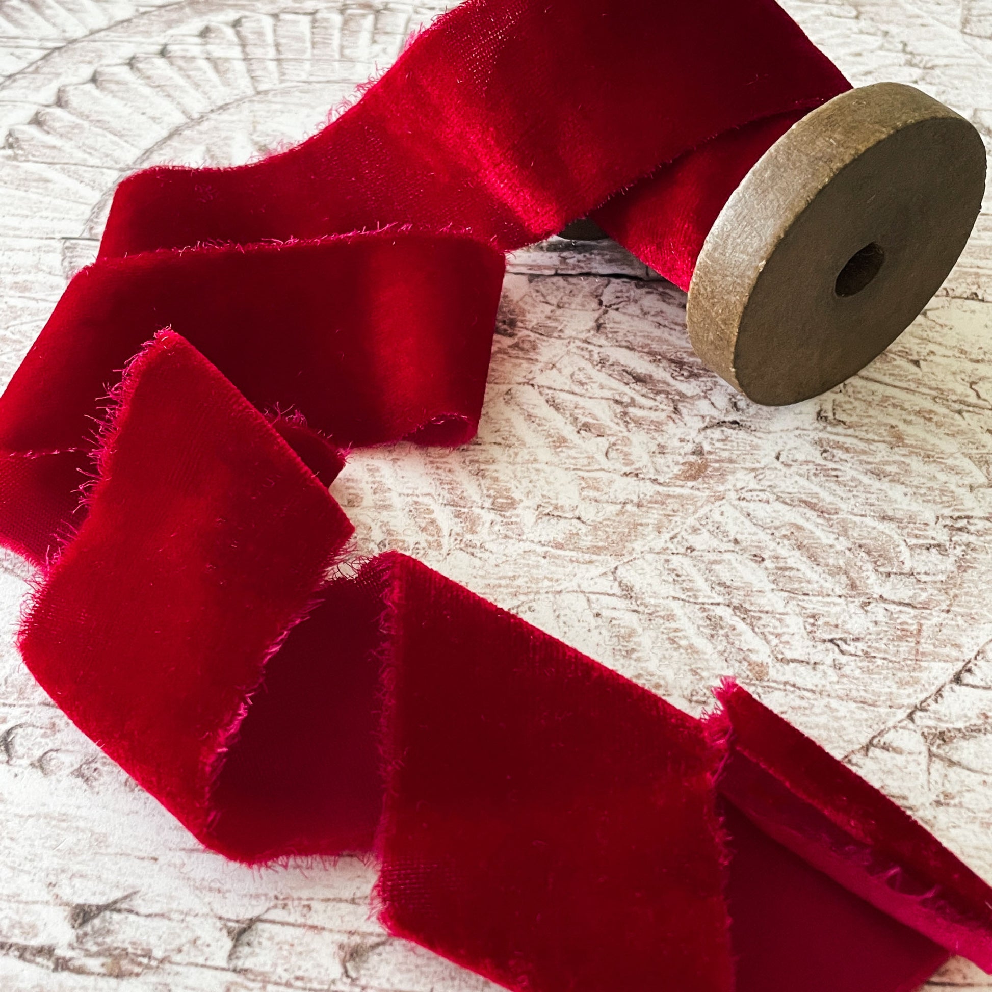 luxury velvet made from silk.  fine velvet ribbon in bright red.  silk velvet ribbon