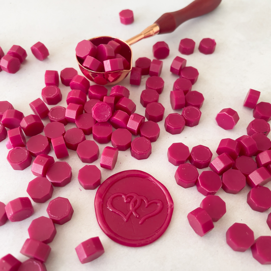 scarlet red sealing wax beads.  Small wax beads to make wax stamps and seals