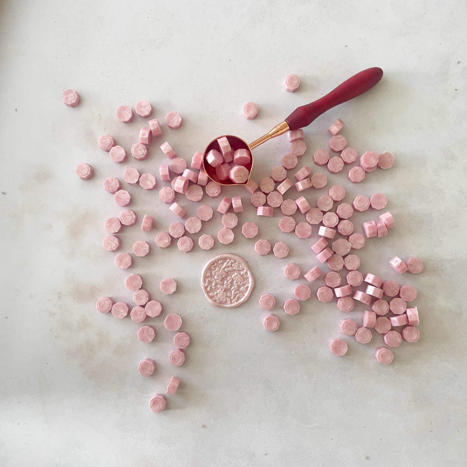 sealing wax beads in pearlised pink.  Small wax beads to make wax stamps and wax seals.  Pearlised pink 
