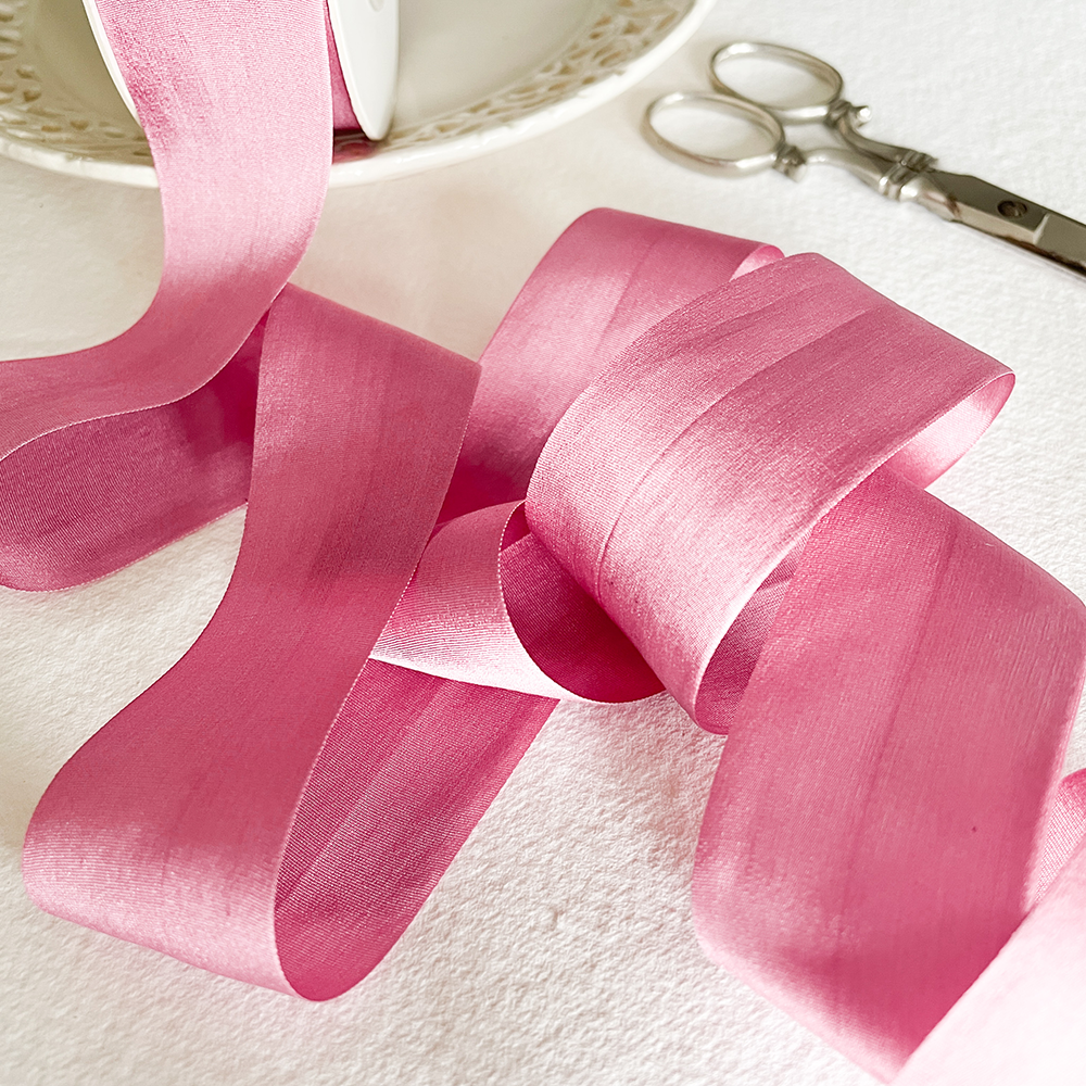 Fine silk ribbon sold by the meter.  Soft raspberry pink colour habotai silk ribbon for crafts.  Perfect for decorating wedding invitations and stationery.  By The Natural Paper Company