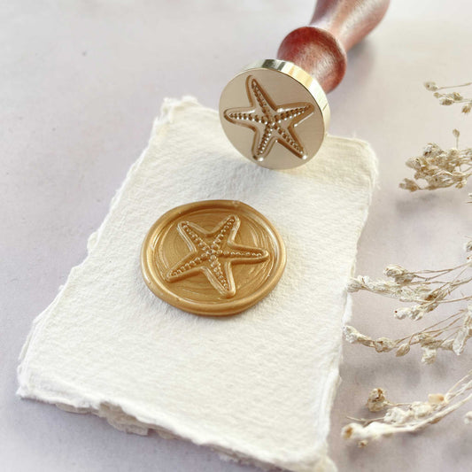Starfish design sealing wax stamp.  Make wax seals with this seashell pattern brass stamp.  By The Natural Paper Company