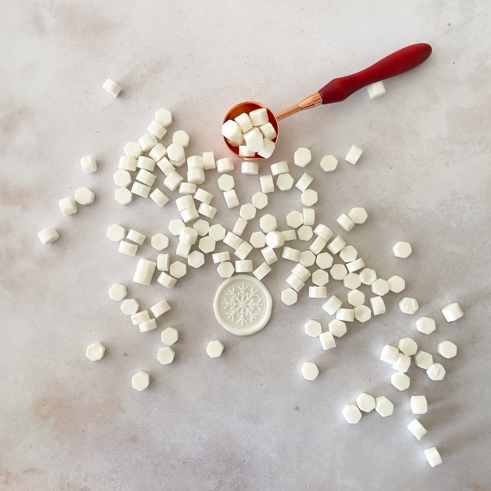sealing wax beads in white.  Small hexagon beads of wax to make wax stamps and seals in white