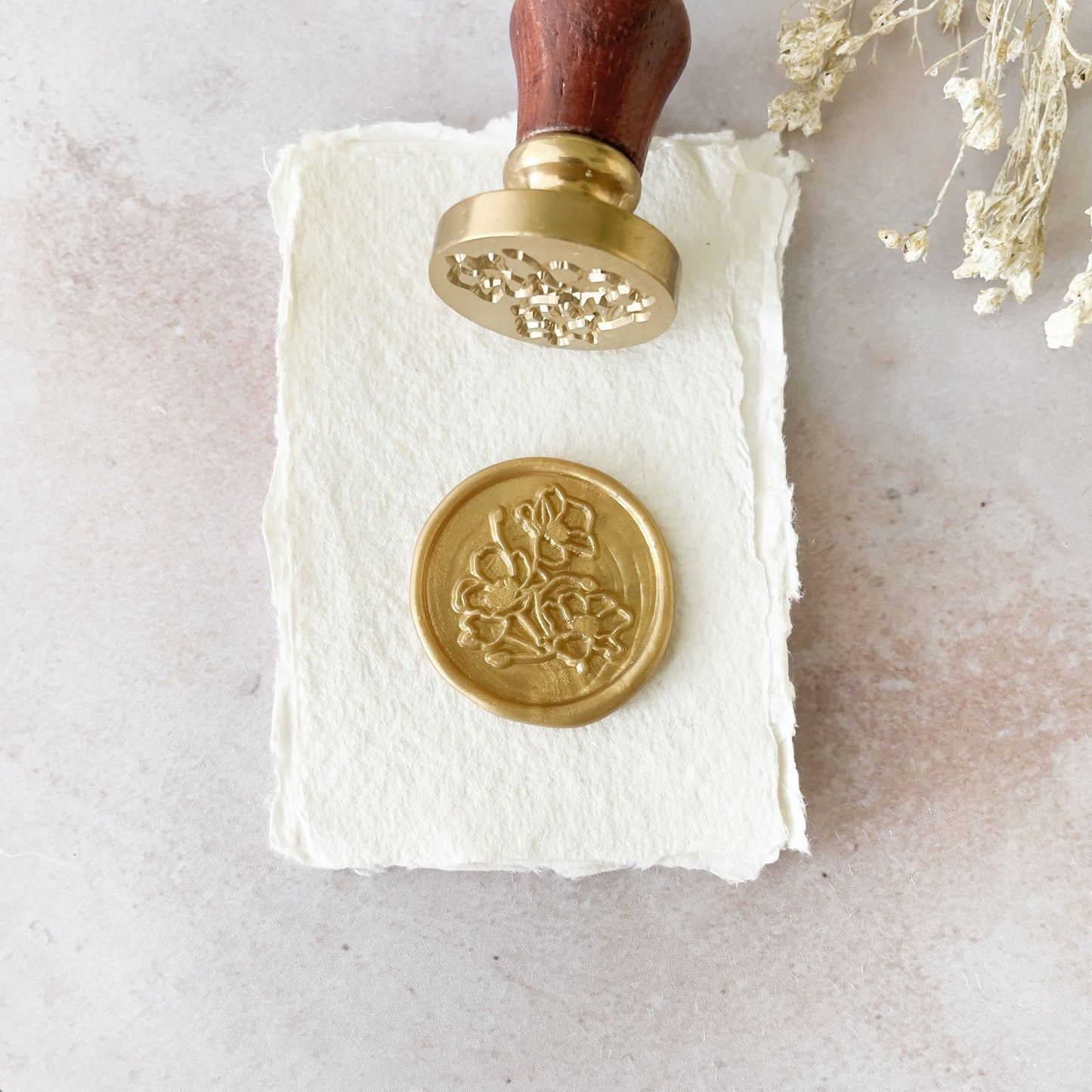 Wild Poppy Wax Stamp to make wax seals.  Sealing wax stamp with a flowery design.  Pretty wax seal to decorate wedding stationery, letters, crafts and packaging.  By The Natural Paper Company