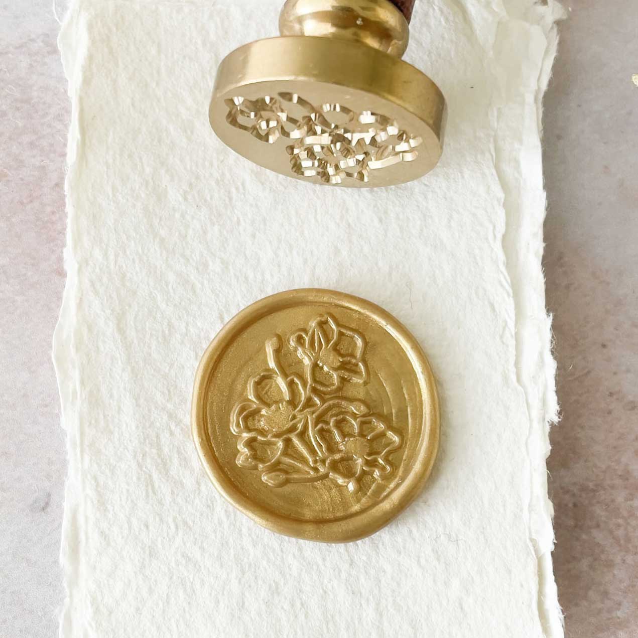 Wild Poppy Floral Wax Stamp to make wax seals.  Make pretty flowery wax seals with your choice of eco friendly sealing wax by The Natural Paper Company